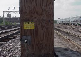 wood door with caution sign